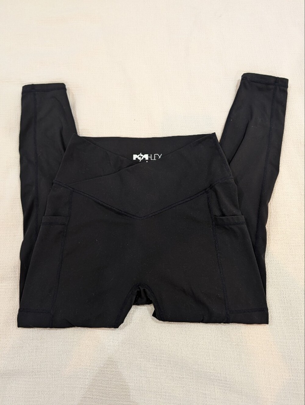 Popflex black crisscross hourglass leggings with pockets size L